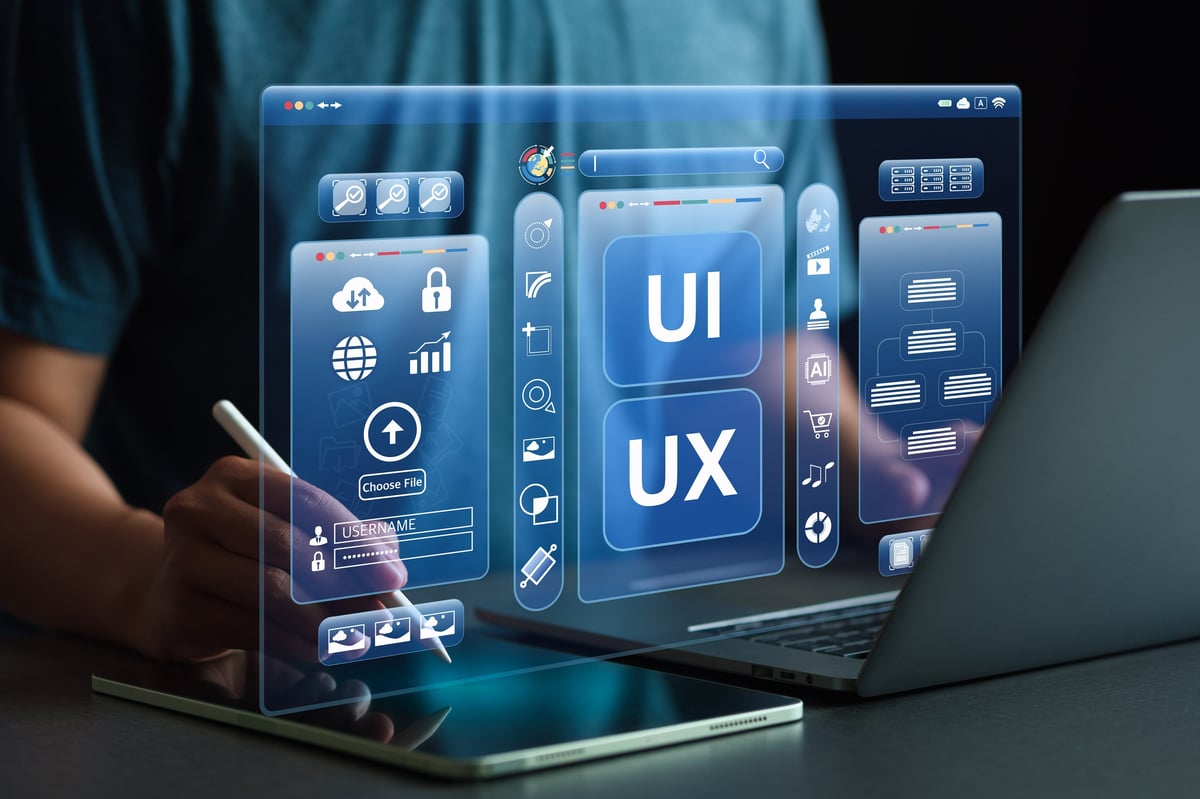 Developers working with interface layouts and design concepts for a website build